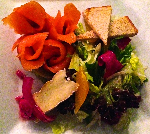 tie-dyed salmon: smoked salmon, artisanal greens, fennel, orange, pickled red onion, brie wedge, toasted rye